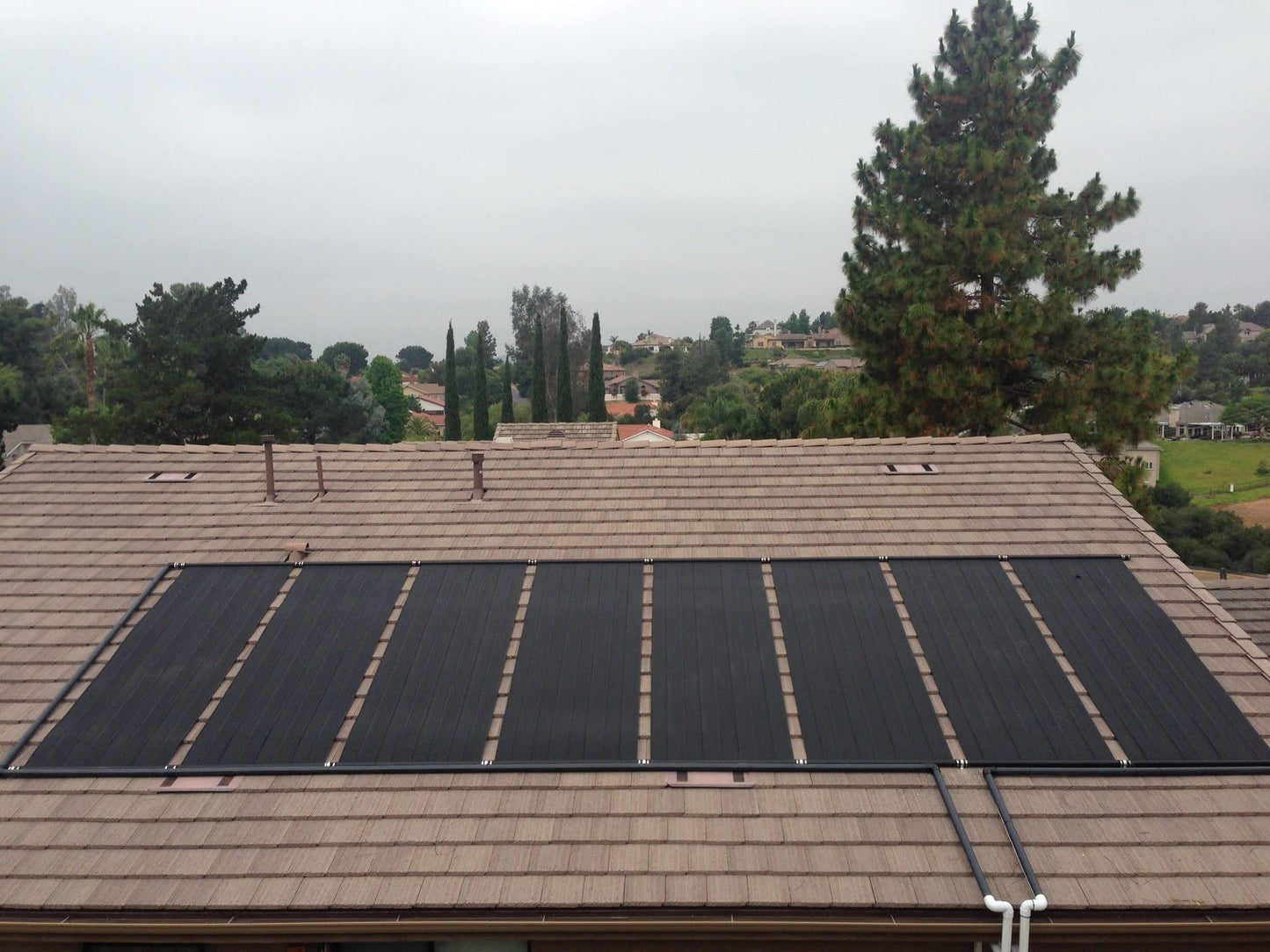 SolarPoolSupply High-Performance Solar Pool Heater Panel - 15-20 Year Life Expectancy, Extreme Durability, Easy Install, High-Heat Performance (2' X 10' / 1.5" I.D. Header) 2' X 10' / 1.5" Header